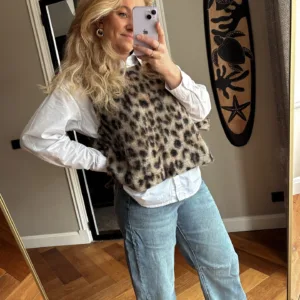 Spencer met strikken zijkant - luipaardprint